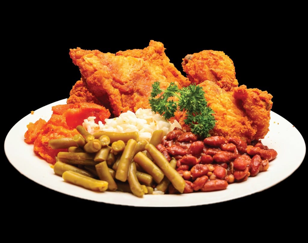 Crispy fried chicken dinner with string beans, red beans and rice, and candied yams at Lonell's Soul Food