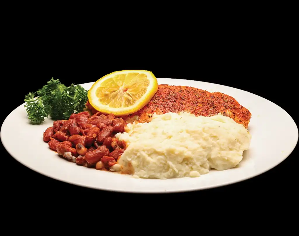 Seasoned salmon fillet with mashed potatoes and red beans at Lonell's Soul Food